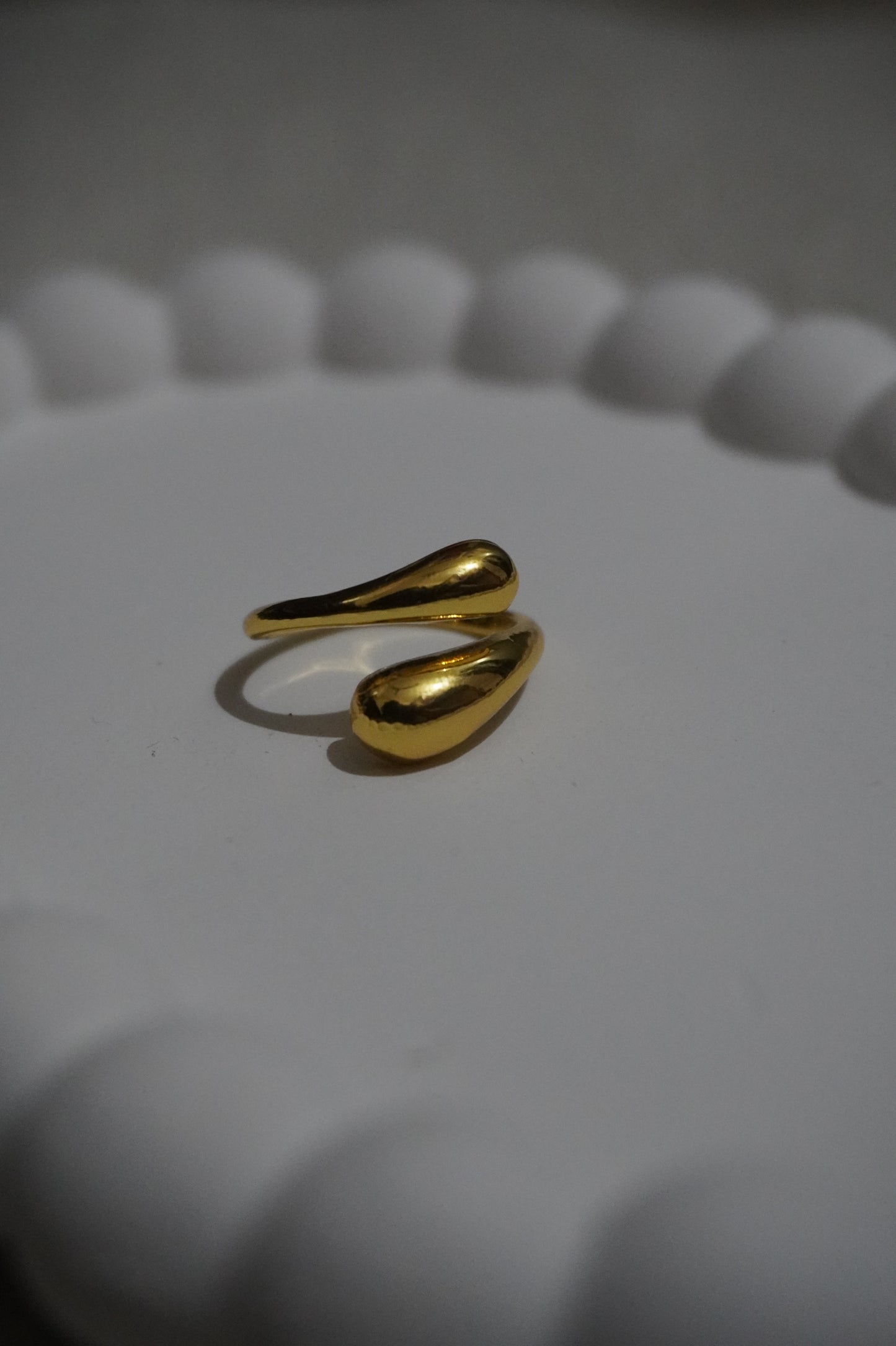 Liquid gold curve ring