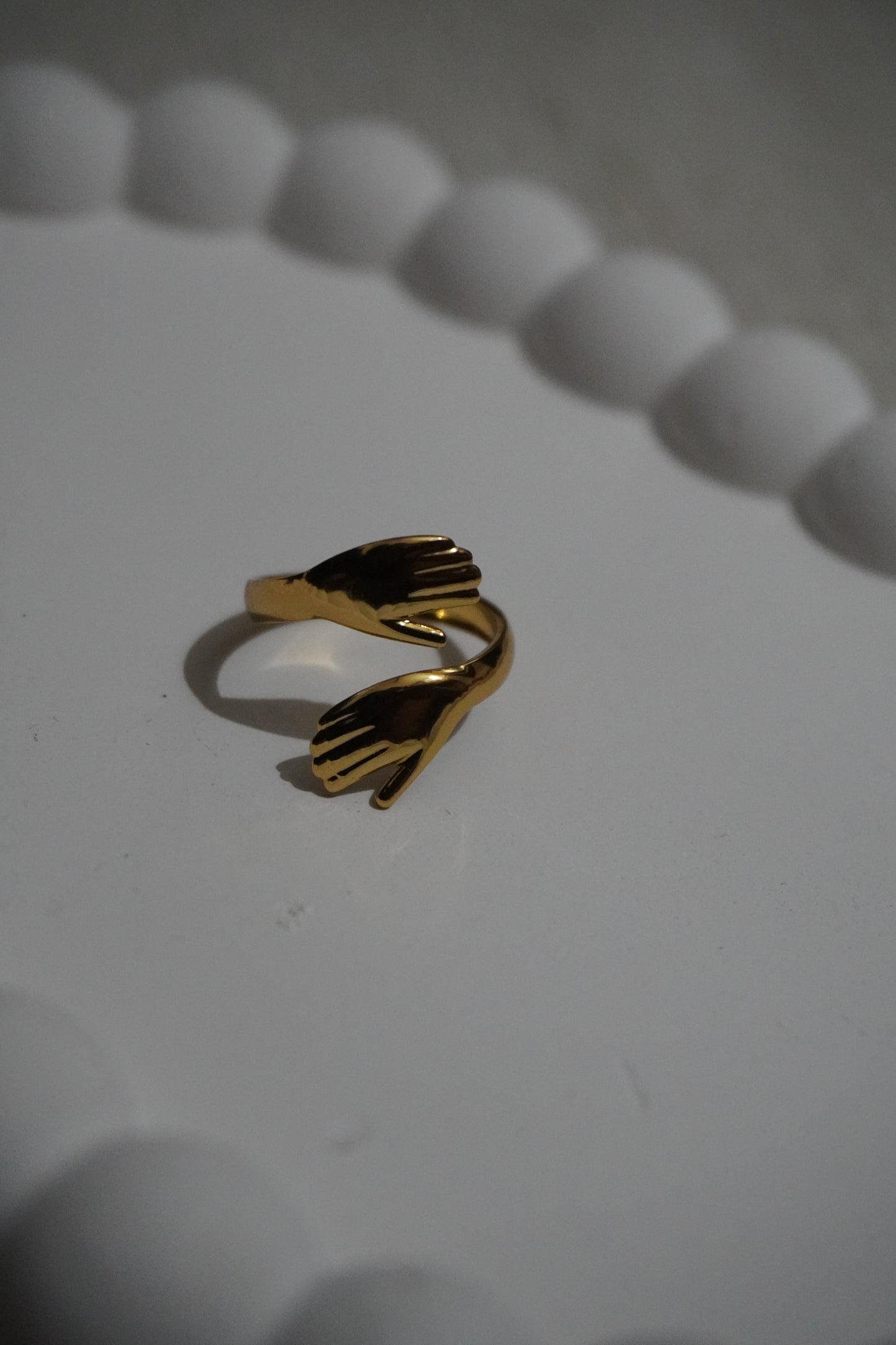 Tiny hug ring