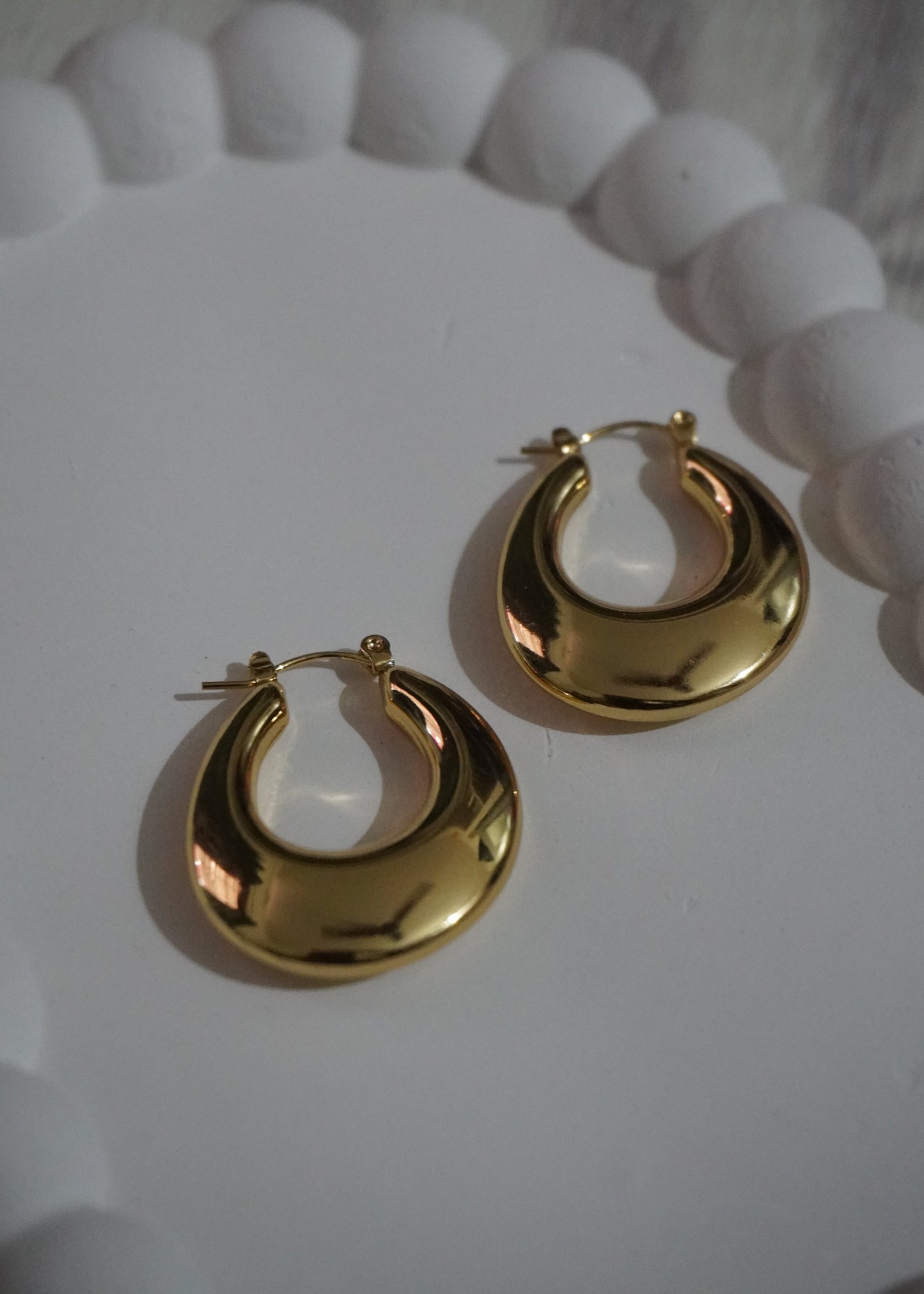 Bold gloss hoops