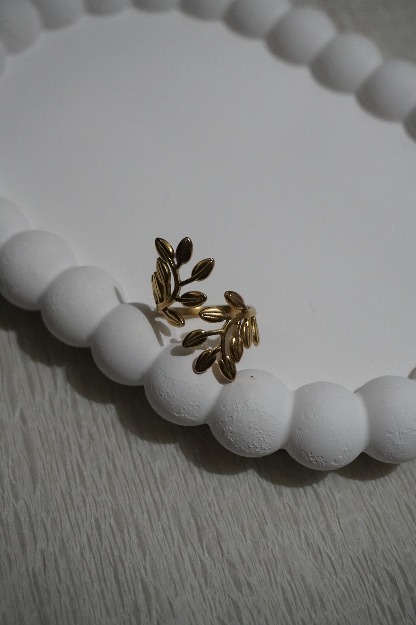 Golden leaf whisper ring