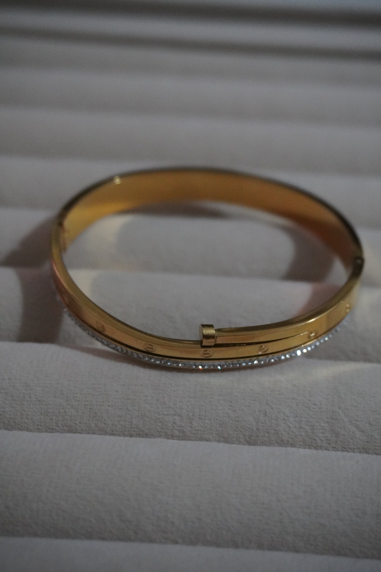 Designer gold cuff bangle