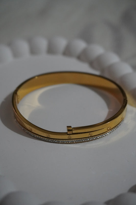 Designer gold cuff bangle