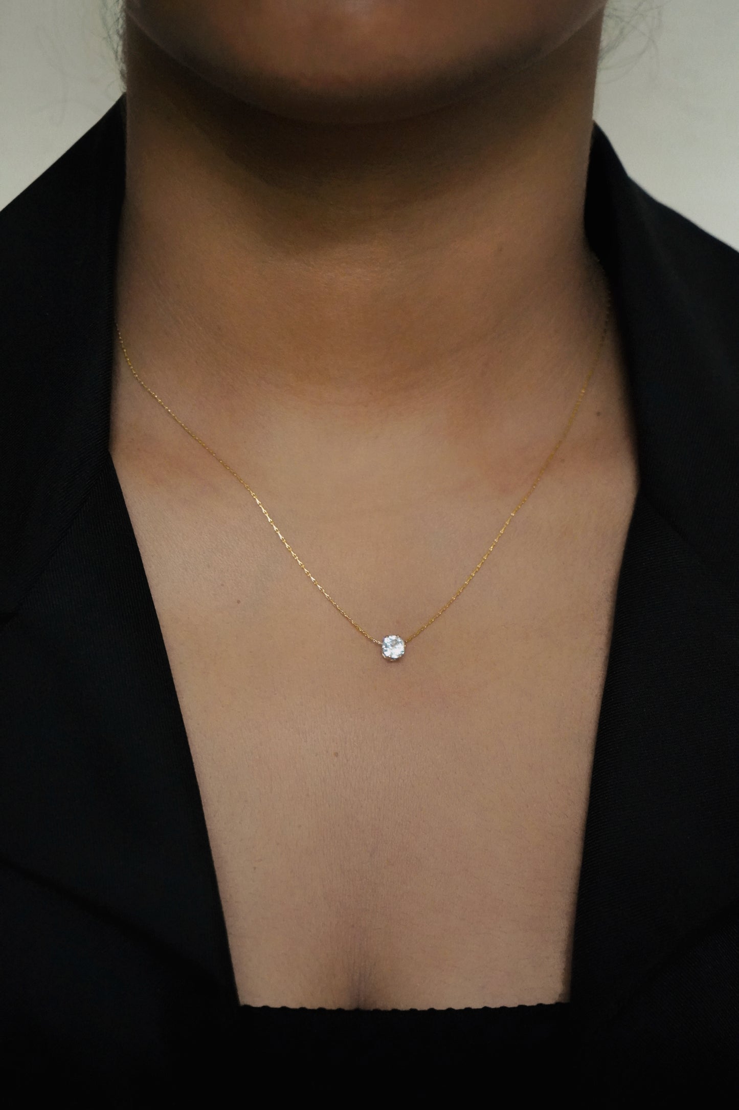 Gold solitaire pendant necklace