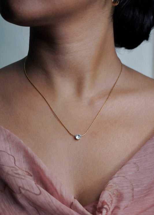 Gold solitaire pendant necklace
